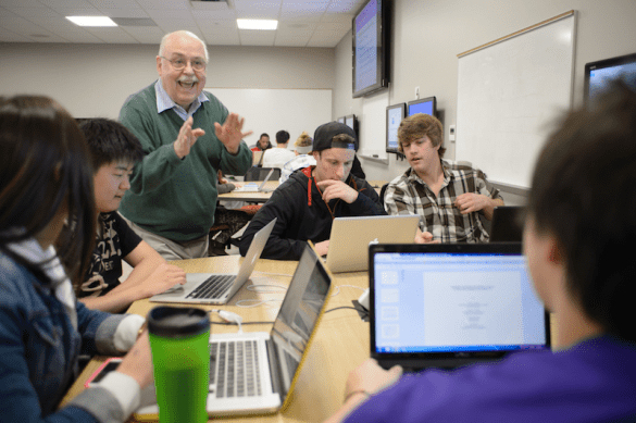 Professor helping students